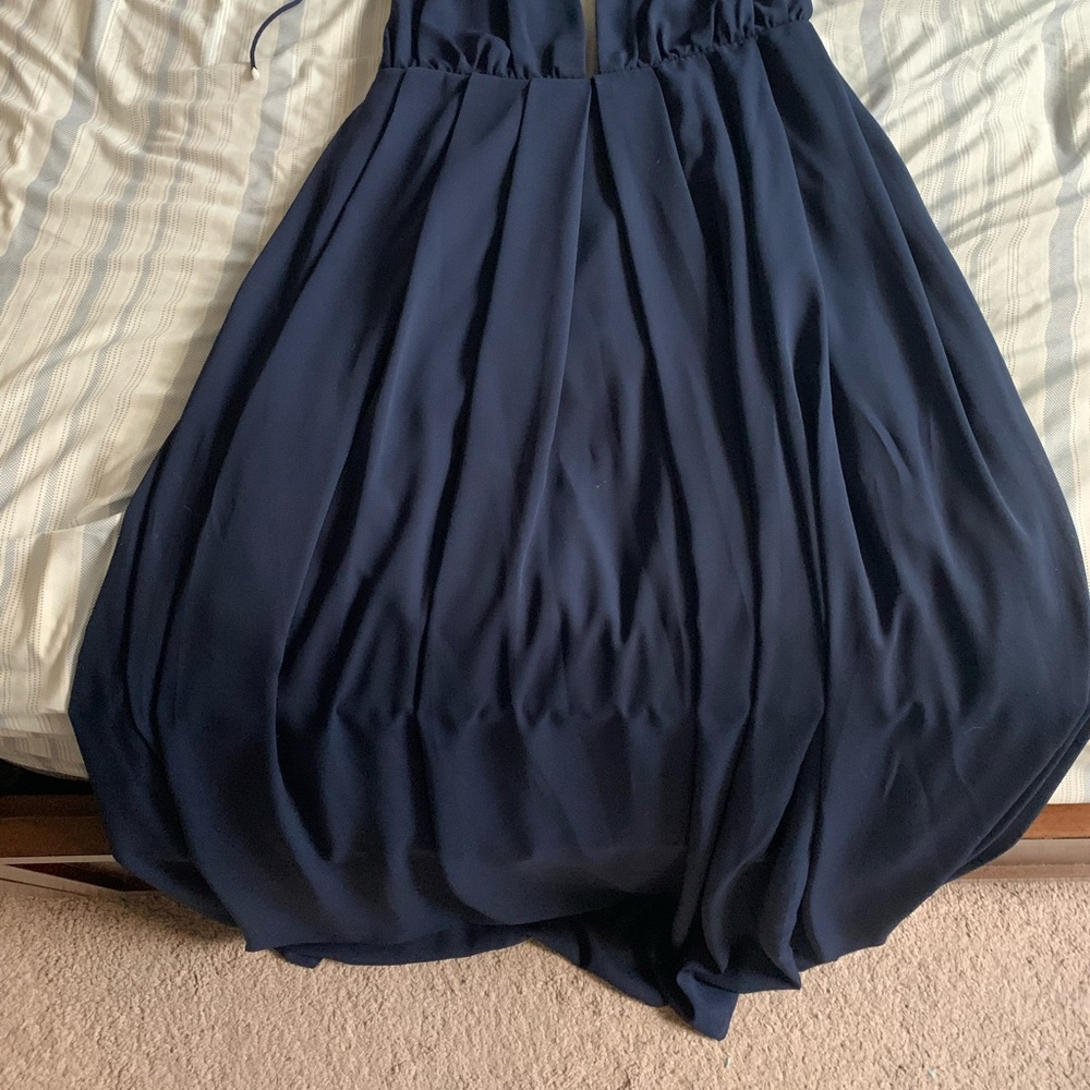 Long navy blue dress backless and open cleavage